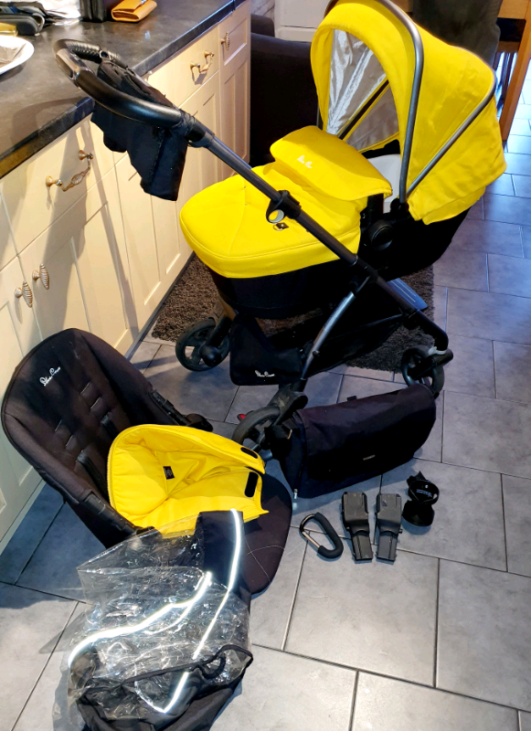 yellow silver cross pram